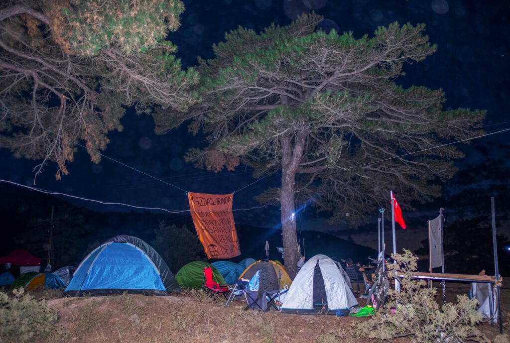 Protest at the Kirazli gold mine. Protesters have made a camp with small tents and banners.